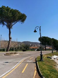 Empty road against sky