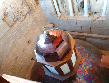 High angle view of chairs and table on floor