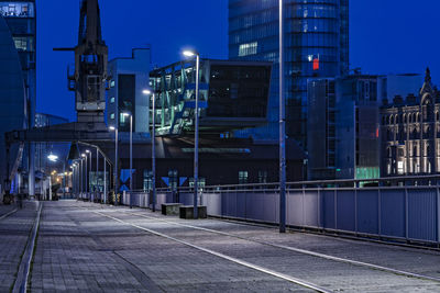 Illuminated buildings in city at night