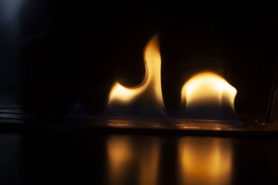 Close-up of burning candle