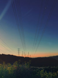 Electricity pylon on field