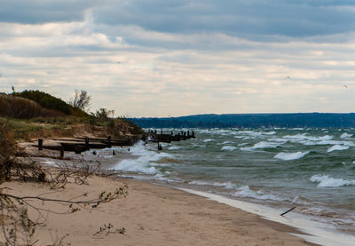 Scenic view of beach against sky