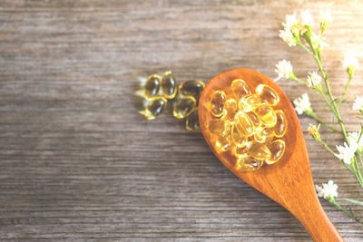 High angle view of orange flower on table