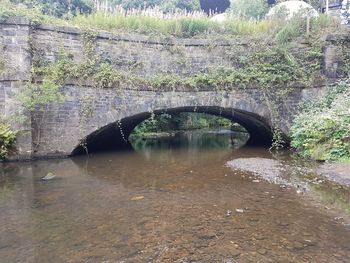 Arch bridge over river