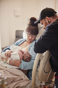 Parents in hospital with newborn baby