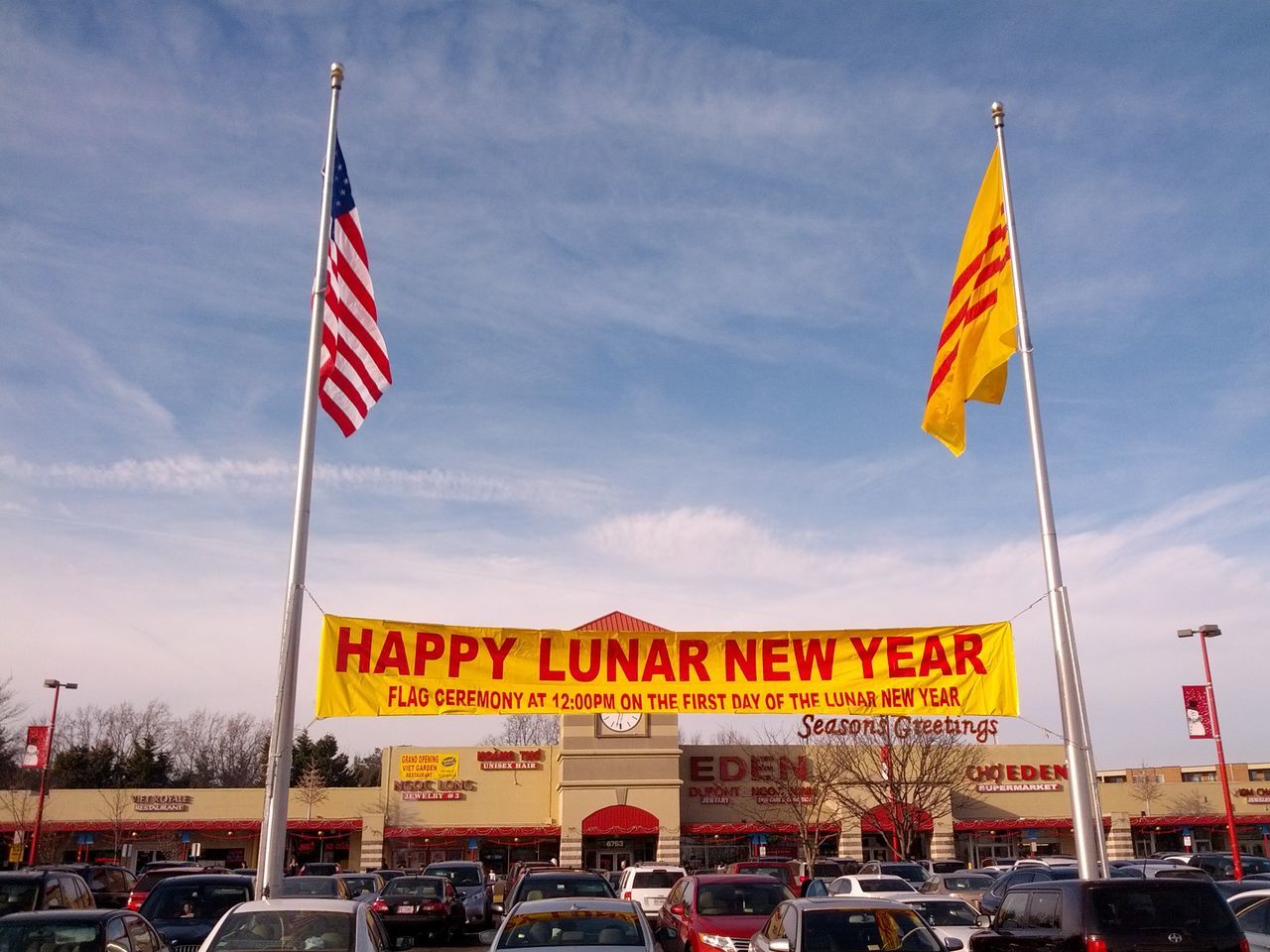 flag, patriotism, identity, national flag, american flag, sky, transportation, culture, red, low angle view, wind, striped, flag pole, pride, pole, mode of transport, cloud, multi colored, cloud - sky, day