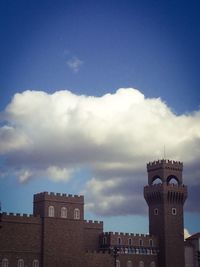 Low angle view of building against blue sky