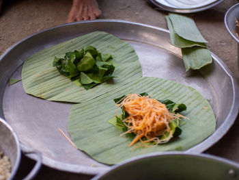 High angle view of vegetables in plate on table