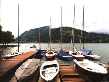 Boats moored in sea