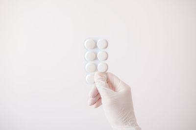 Human hand holding white background