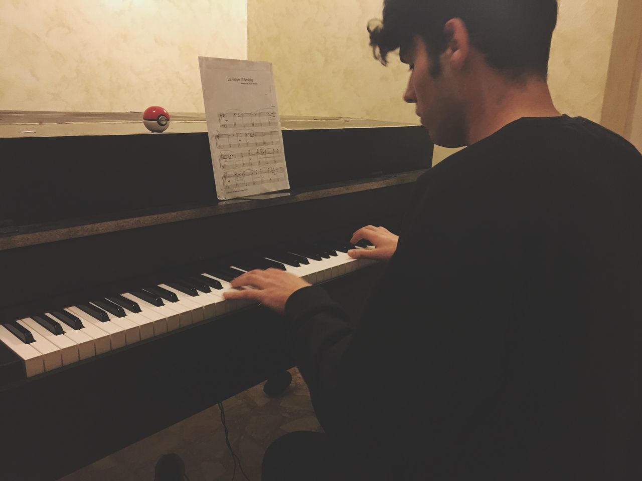music, piano, musical instrument, playing, pianist, musician, sheet music, indoors, arts culture and entertainment, piano key, skill, one person, real people, leisure activity, practicing, men, sitting, home interior, lifestyles, learning, performance, classical music, musical note, day, human hand, young adult, people