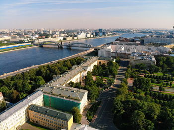 High angle view of river amidst buildings in city
