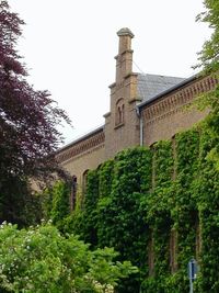 Low angle view of historic building against clear sky