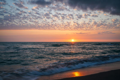 Scenic view of sea against sky during sunset