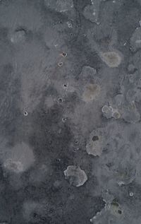 High angle view of water on concrete wall