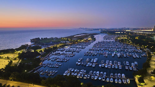 High angle view of city at sunset