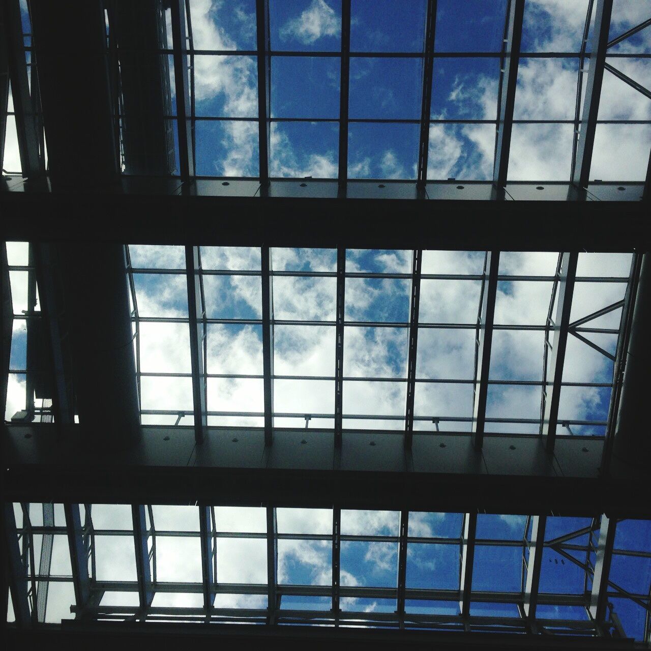 VIEW OF MODERN BUILDING AGAINST SKY