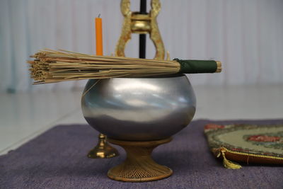 Close-up of container on table