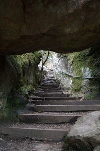 Staircase leading towards cave