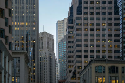 Modern buildings in city at dusk