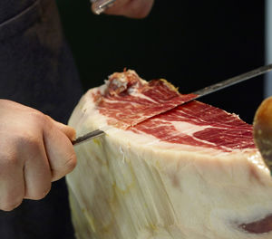 Close-up of hand holding ice cream