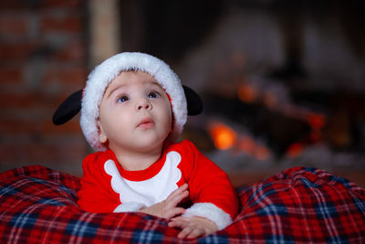 Portrait of cute boy looking away