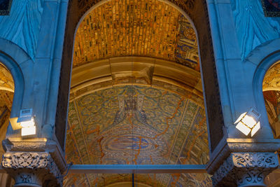 Low angle view of ornate ceiling of building