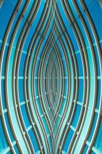 Low angle view of metallic structure against sky