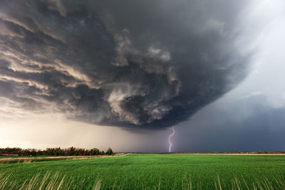 Dramatic storm clouds and lightning beneath a supercell thunderstorm near herington, kansas