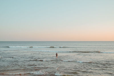 Scenic view of sea against clear sky