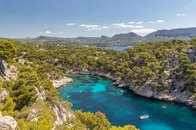 High angle view of swimming pool by sea against sky