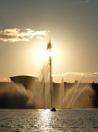 Scenic view of lake against sky during sunset. kazan, fountain on the kaban lake.