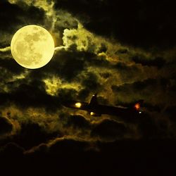 Scenic view of moon against sky at night