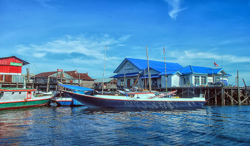 Moored boats against built structures