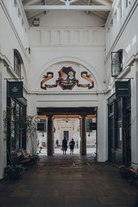 People walking in building