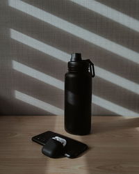 Close-up of black coffee on table