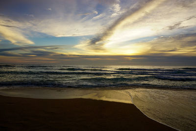 Scenic view of sea against sky during sunset