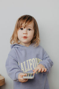 Portrait of cute baby girl at home