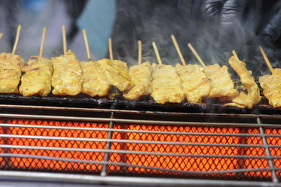Close-up of meat on barbecue grill