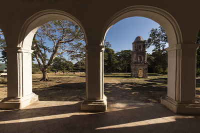 Archway of historic building against sky