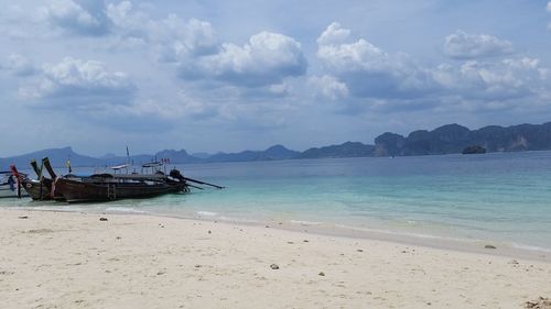 Scenic view of beach against sky