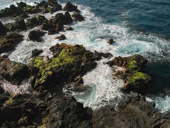 Waves splashing on rocks