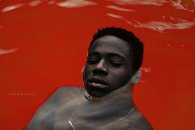 Close-up portrait of man swimming in pool