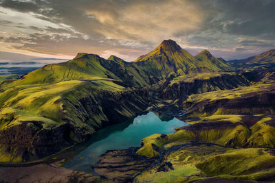 Scenic view of mountains against sky during sunset