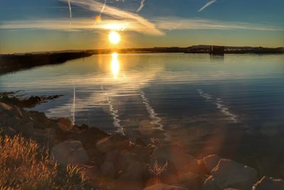 View of calm sea at sunset