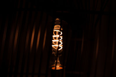 Low angle view of illuminated light bulb