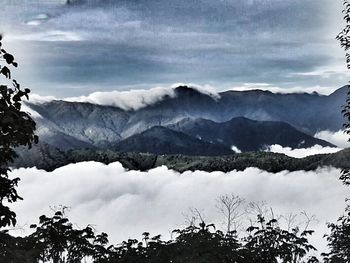 Scenic view of mountains against sky during winter