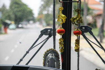 Good luck charm hanging against windshield