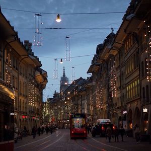 View of city street at dusk