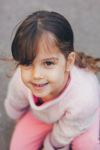 Portrait of cute girl smiling